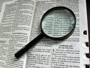 Picture of Magnifying Glass over Bible.